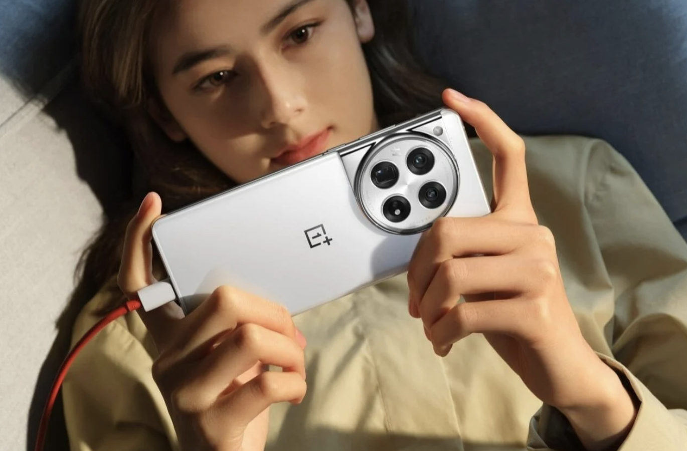 Girls holding onePlus phone